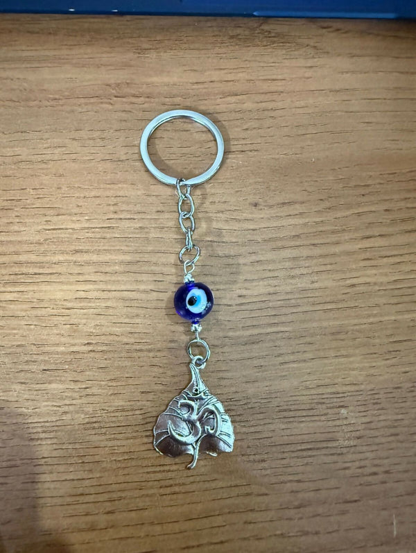 Om blue evil KEYCHAIN